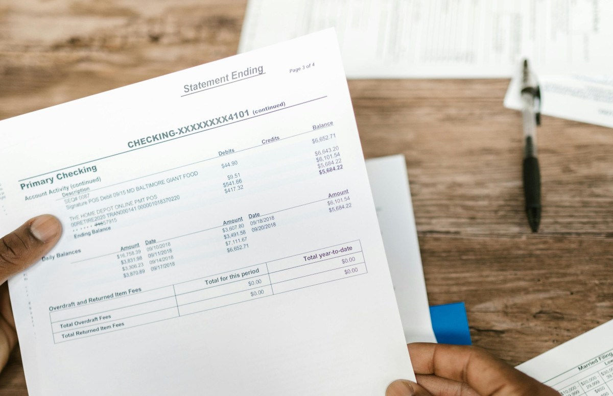 Mobile notary reviewing bank documents in Maryland